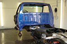 Southern Truck paints the frame of this Ford F250 truck to give the complete truck a restored "new" look again..