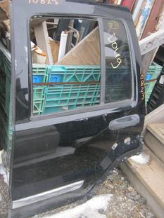 2002 2003 2004 2005 2006 Jeep Liberty drivers side rear power door.  Good overall condition.  Some scuffs in the paint.  Reference inventory #10823 when inquiring.