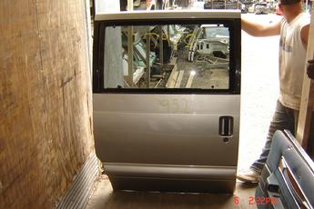 2001 Chevrolet Astro Van Right side slider door.  Good condition, 1 stone chip and small dent.  Beige exterior.  Fits years 1995 - 2005.