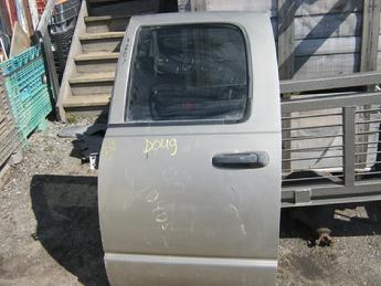 2002 2003 2004 2005 2006 2007 2008 2009 Dodge drivers side rear manual crew cab door.  Door has a dent below the door handle and some scratches in the paint.  Reference inventory #10887 when inquiring.