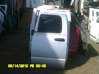 2002 2003 2004 2005 2006 2007 2008 2009 Dodge Quad cab rear drivers side complete power door.  Some scuffs & scratches on face of door.  Inventory #12364.