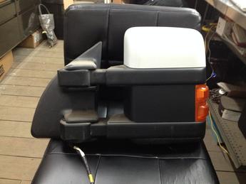 2008 2009 2010 2011 2012 2013 2014 Ford Superduty drivers side tow type power mirror with turn signal. Top is painted white, bottom is textured black.  Inventory #8422.
