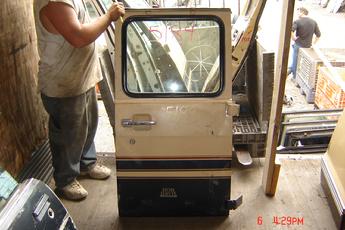 71 - 96 Chevrolet Van Right Cargo Door.  OK condition, glass intact, Tan & black exterior.