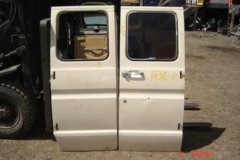 75 - 91 Ford Van Side Doors.  Left door is missing the window.  Pop out windows.  Excellent condition, 1 ding in middle of right door.  White exterior, brown interior.