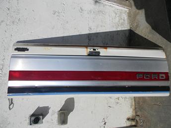 1987 1988 1989 1990 1991 1992 1993 1994 1995 1996 1997 FORD TAILGATE. DECENT CONDITION- HOLE CUT ABOVE THE LATCH, DENT ABOVE THE LATCH, DENT ON LEFT SIDE IN THE CHROME PANEL, LIGHT SURFACE RUST, #14269