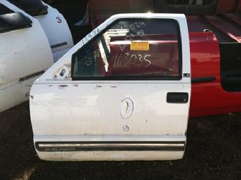 1994 1995 1996 1997 1998 1999 2000 2001 2002 2003 2004 Chevrolet Blazer GMC Jimmy drivers complete power door.  Some dents in the middle of the door.  Some scuffs and scratches in the middle of the door below the window.  No interior panel.  Inventory #11976.