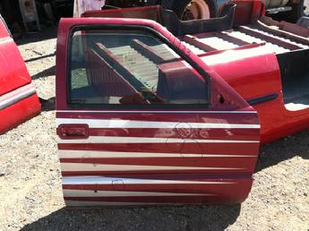 1994 1995 1996 1997 1998 1999 2000 2001 2002 2003 2004 Chevrolet S10 GMC Sonoma passenger side manual complete with glass & hardware.  Door has 4 dents in the middle, lower section.  The paint is chipped along top rail of window.  Bottom seam is starting to rust.  Inventory #11983.