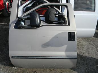 1999 2000 2001 2002 2003 2004 2005 2006 2007 FORD SUPER DUTY DRIVERS DOOR. A COUPLE OF CREASES, MISSING INSIDE PANEL, POWER WINDOW. RUST FREE. #14064
