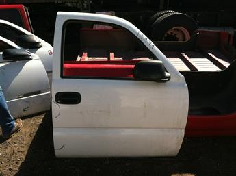1999 2000 2001 2002 2003 2004 2005 2006 2007 Chevrolet GMC passenger side complete manual door.  Small dents in the rear, middle just under the door handle.  Small paint chips on top rail above window.  Inventory #11979.