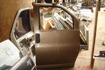 1996 - 2002 GMC 3500 Front Van Door Shell.  Very clean, no hardware or glass, inside sheet metal has a tear by the speaker.  Brown exterior. $100