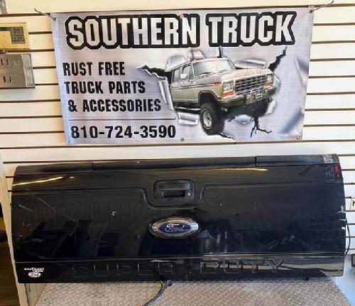 2013 2014 2015 2016 FORD SUPER DUTY TAILGATE WITH STEP AND CAMERA. SCATTERED DINGS AND SCRATCHES- TUXEDO BLACK. RUST FREE. #16016